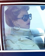 Jennifer Lawrence - Neck Brace and Bouffant Beauty On Set
