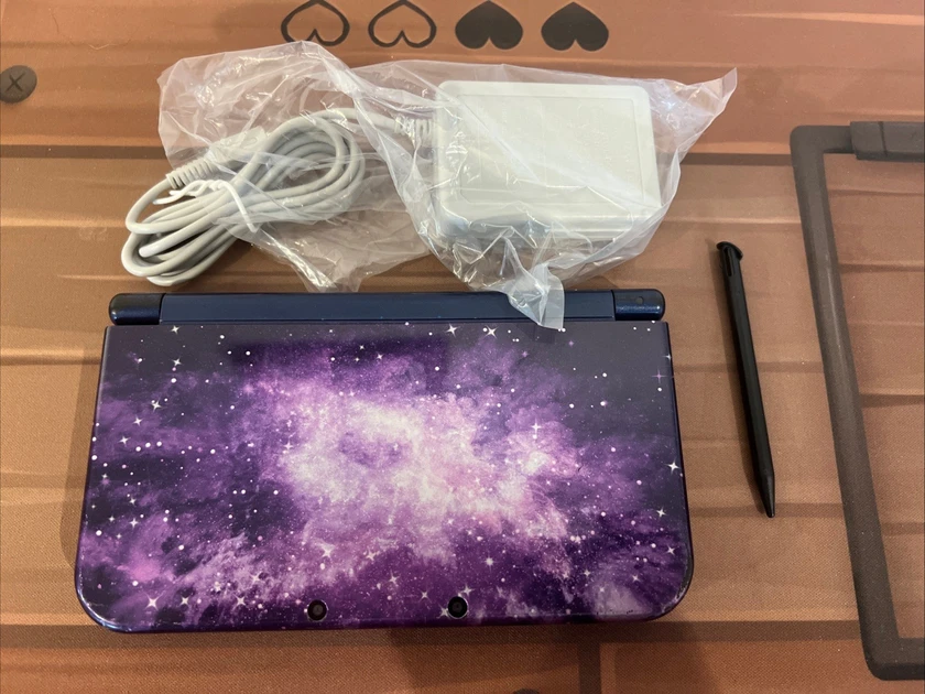 nintendo new 3ds xl galaxy edition handheld system - purple - $130 thumbnail 2