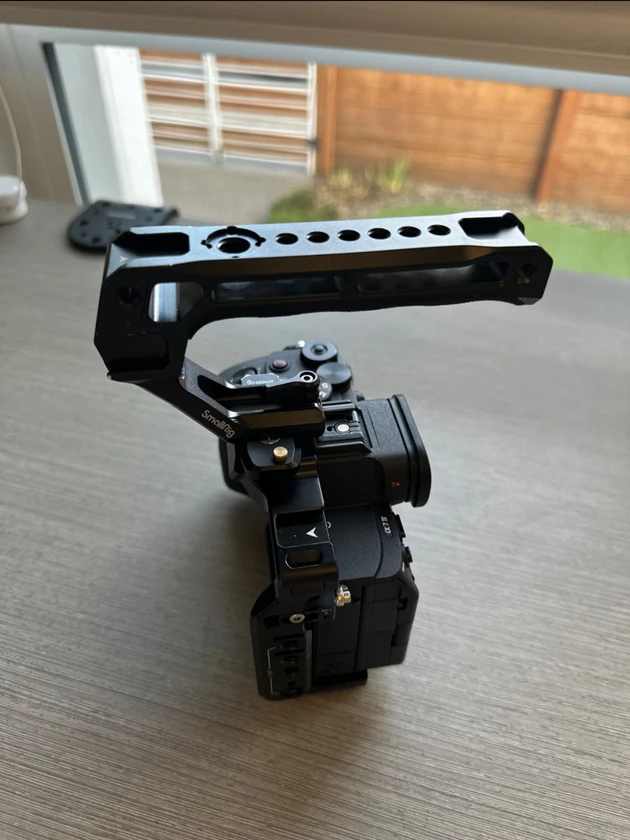 sony a7 iv camera, half cage, and top handle - $1,200 thumbnail 6