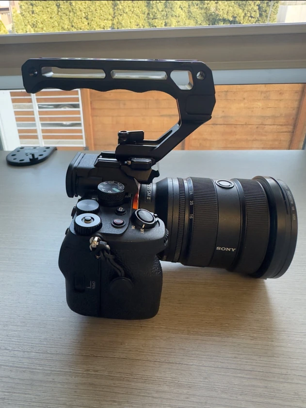 sony a7 iv camera, half cage, and top handle - $1,200 thumbnail 7