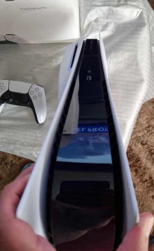 play station 5 for sale. dm if interested, comes with 2 controller and a free ga thumbnail 2