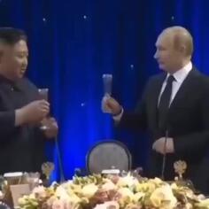 Putin and Kim Jong Un Toast