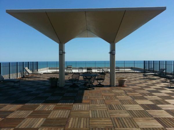 $1,100 large studio in high rise condo with a million dollar view thumbnail 4