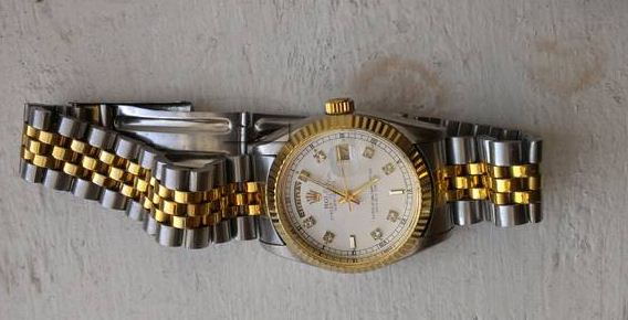 rolex oyster perpetual stainless steel & 18k gold mens watch - $3,000 thumbnail 2